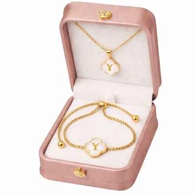 Cadena y pulsera con dije enchapado en oro