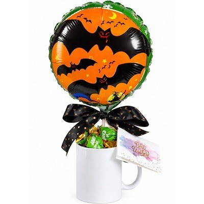 Taza con chocolates variados y globo halloween
